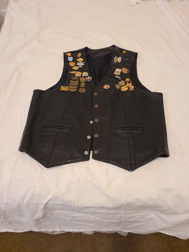 Black Leather Vest with numerous ride pins