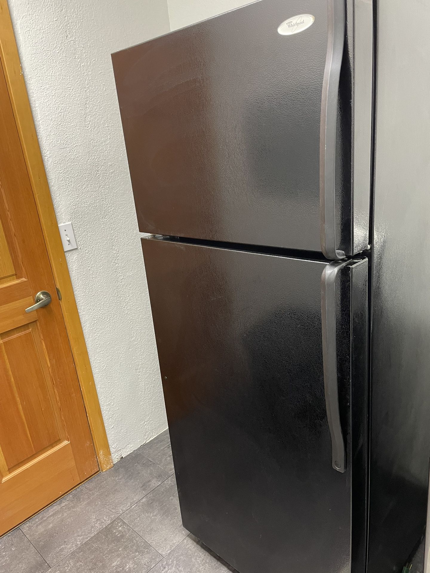 Black Whirlpool Refrigerator/freezer