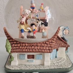 Walt Disney's Pinocchio When You Wish Upon a Star Musical Snow Globe