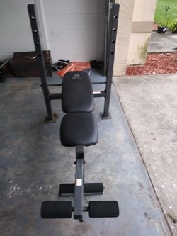 Barely used gold gym bench.