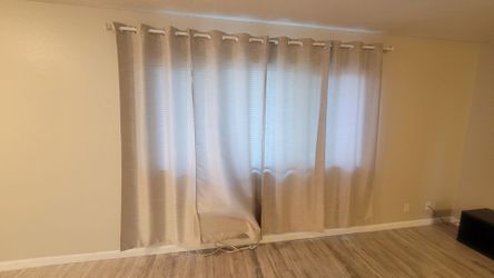 4 curtains and hanging rod