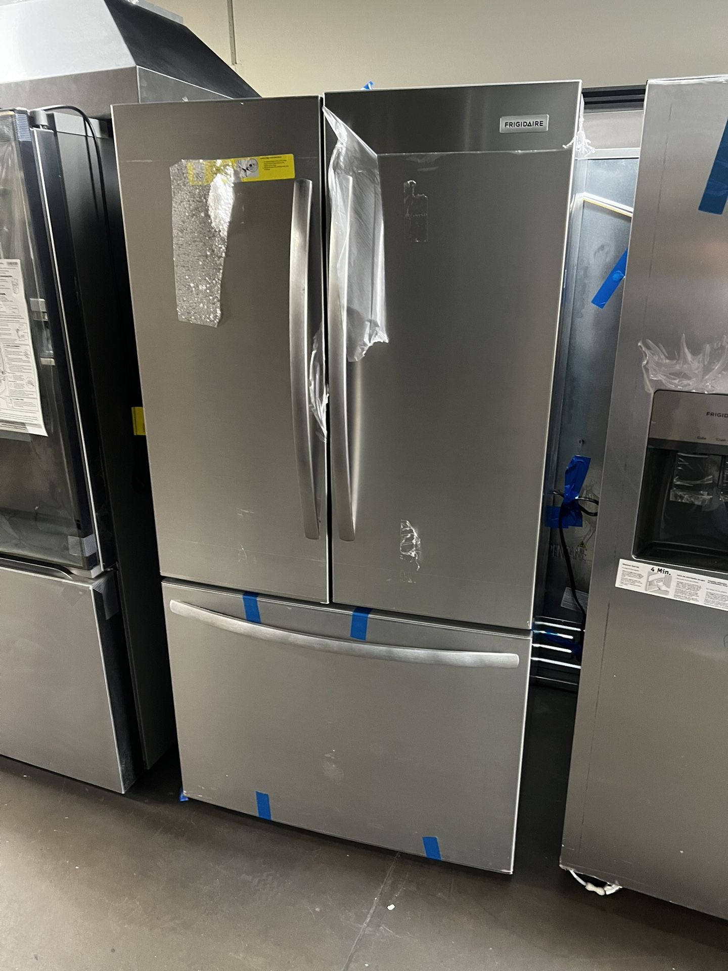 New Open Box Frigidaire French Style Refrigerator With Interior Water/Ice Dispenser
