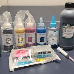 Epson Refillable Ink Cartridges And Ink. Some New. 