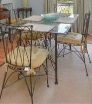 Glass Top Dining Room Table With Six Upholstered Chairs. It Is On A Brass Ornate Frame. It Was Made By Pier One