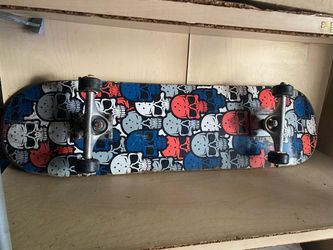 Skateboard with damaged wheels