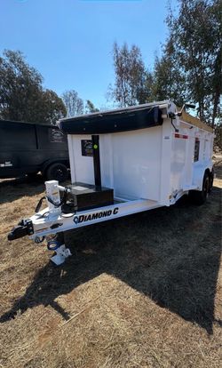 2026 Diamond C Dump Trailer - Retail $15,850.00 Diamond C MDT comes standard with a front-mounted 3-stage heavy-duty telescopic cylinder hoist.