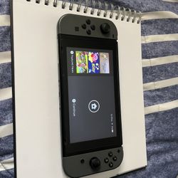 Used Good Condition Nintendo Switch, Black And Case/games