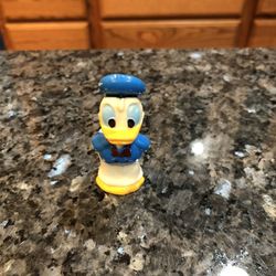 Toy Vintage Disney Donald Duck Rubber Figure.  Size 2 1/4 inches tall and 1 inches wide.  Preowned has minor paint wear due to age.  See pictures.  