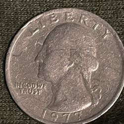1977 Quarter With A Missing Mint Mark Or Letter.