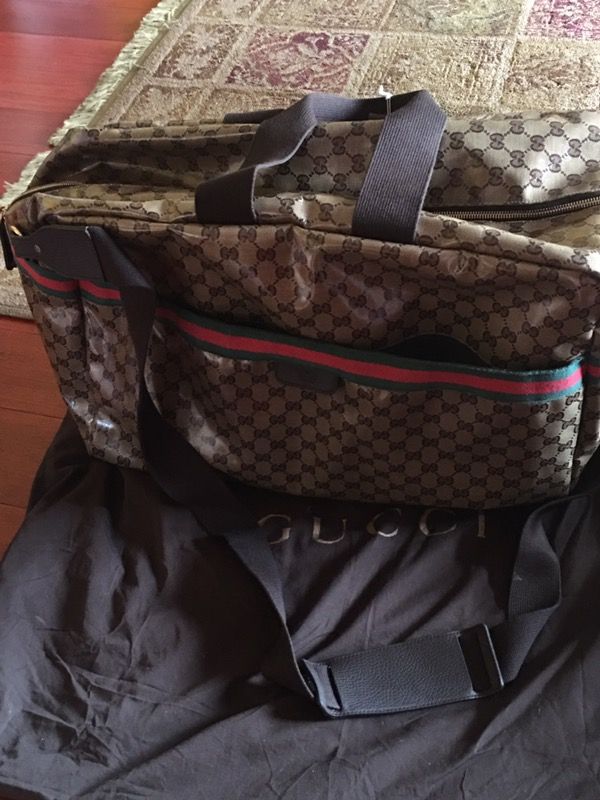 Authentic Gucci carry on complete with dust bag