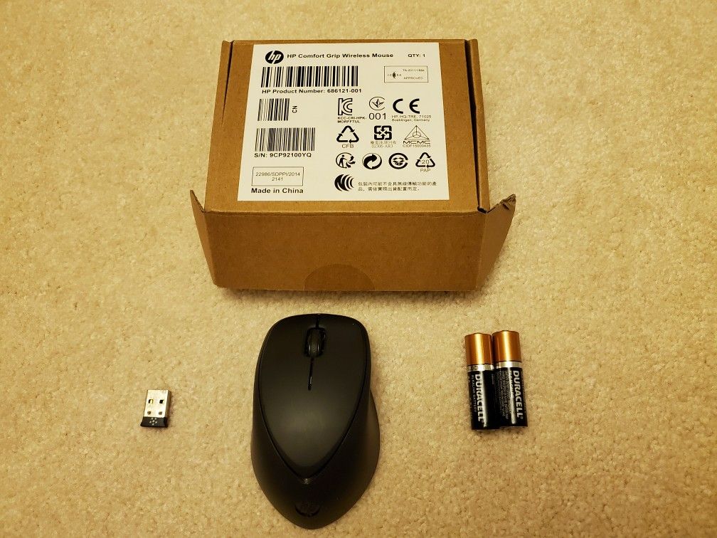 New HP Comfort Grip wireless mouse with new batteries