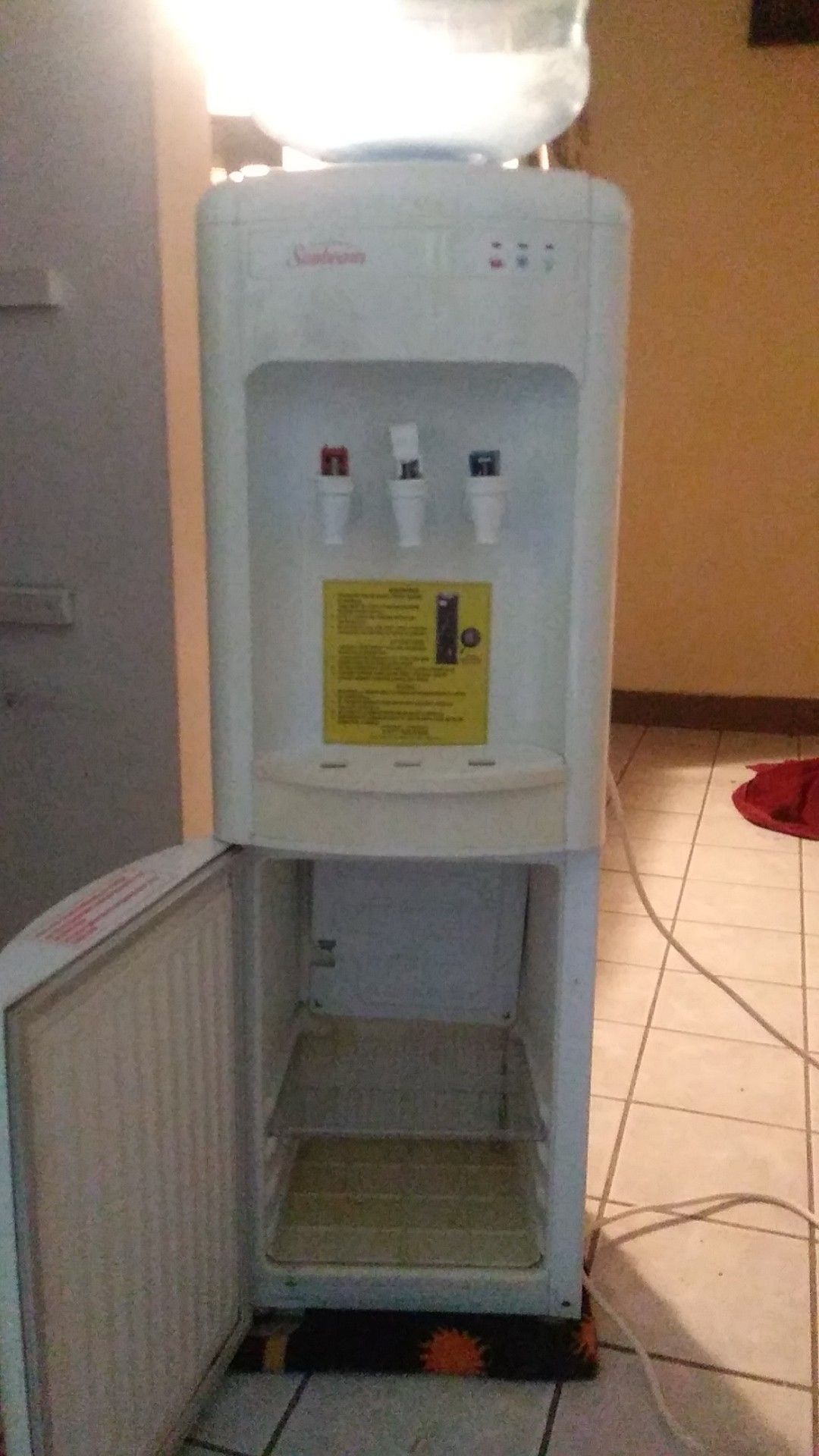 Sunbeam water cooler with 5 gallon bottle