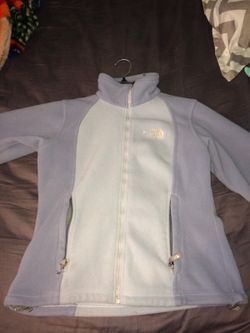 Blue and grayish North Face