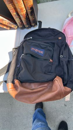 JanSport Black Backpack with Leather Bottom