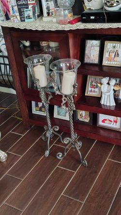 Big metal tall candles , stands 2 feet and a half high