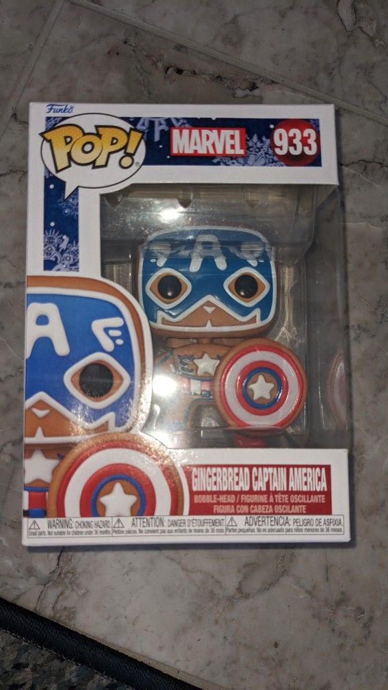 Gingerbread Captain America #933 - Marvel Holiday Pop! Vinyl Figure.

In perfect new condition.

Never been removed from the box.

Box is in good shap