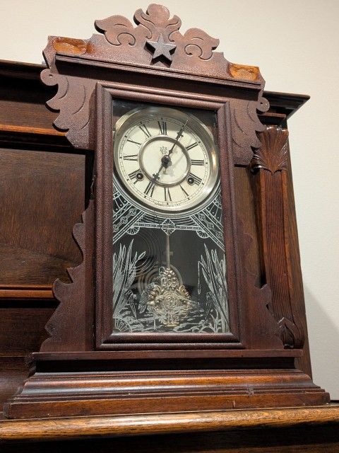 Late 1800s antique Waterbury clock. Nice face/dial and beautiful pendulum. Has gong chime and key. Movement appears as if it was serviced and cleaned,