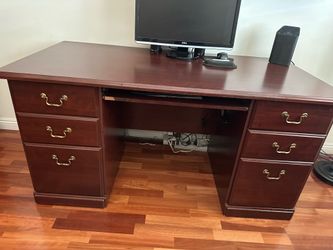 Mahogany banker’s desk  . with file cabinet drawer. and pull out keyboard shelf