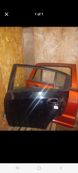 2011 sentra left rear door black 
