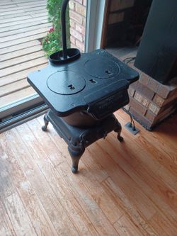 Vintage cast iron stove lamp. 2 of them available $300 for both