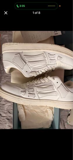 Amiri white skel low top