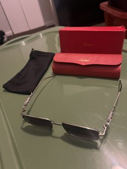 Men Cartier shades with jaguar 