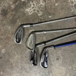 4 Golf Clubs 