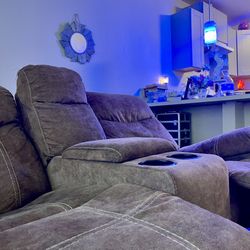 Tan Reclining Loveseat 