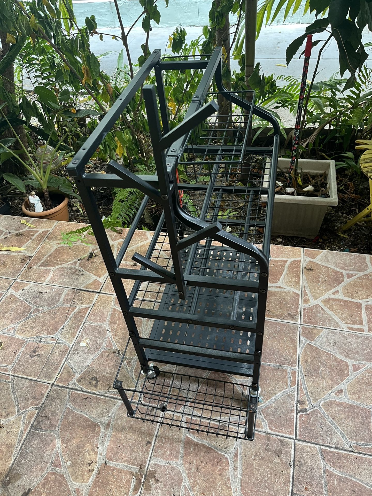 Home gym storage rack. It is a multi-functional rack designed to organize various workout equipment like yoga mats, dumbbells etc. Proteins Storage a