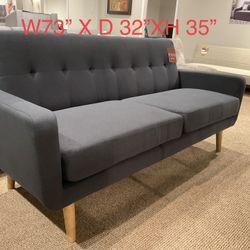 New sleeper sofa futon by Serta floor sample