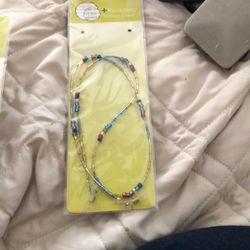 Set of two reader, glasses, chords, new never used