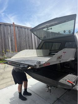 Sliding bed truck bed