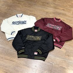 SUPREME X MITCHELL & NESS CAMO VARSITY JACKET