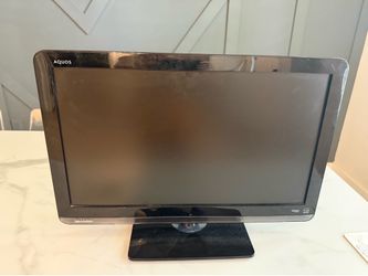 FREE Sharp 21” LCD TV with Stand