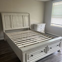 Cream Colored Wood Frame For Queen Sized Bed And Small Cream Colored Drawer 
