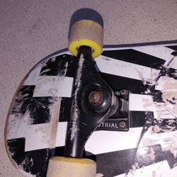 Preowned skate board with industrial trucks