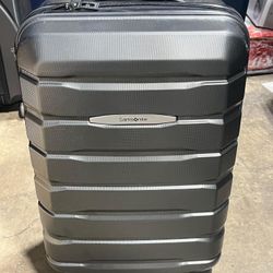 Samsonite carry on 22”