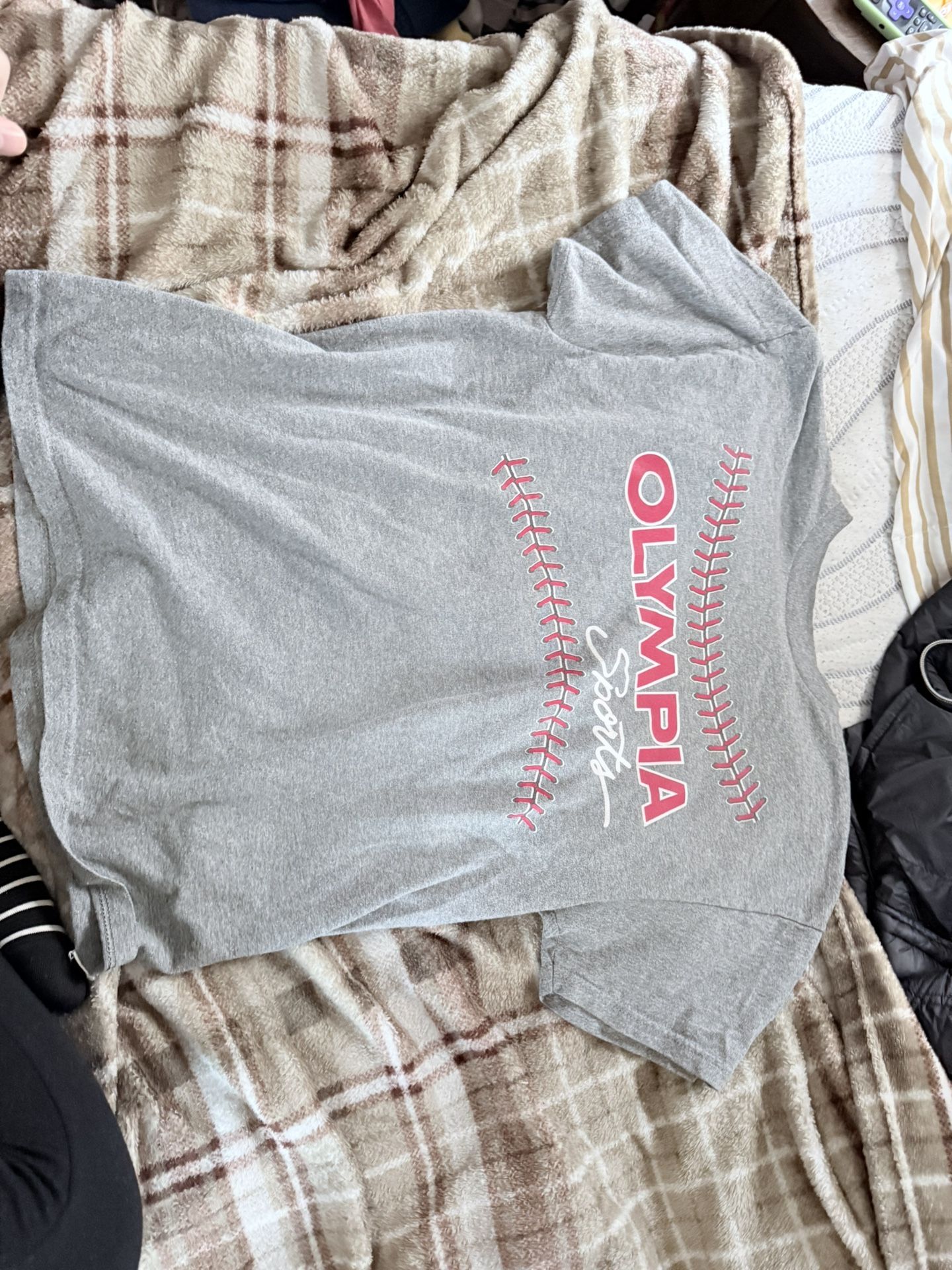 Olympia sports T Shirt