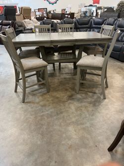 Seven piece counter height dining room set