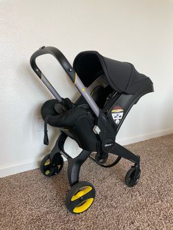 Doona Stroller + Base. Lightly Used. Clean.