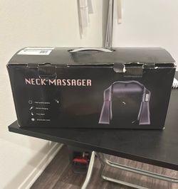 Heated neck massager