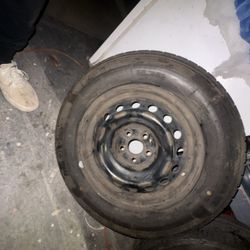 Two Used Tires With Rims
