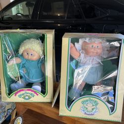Cabbage Patch Dolls: Dulcie Minda (1985) and Cissie Janette (premie 1884). Brand New, in original box with adoption papers 
