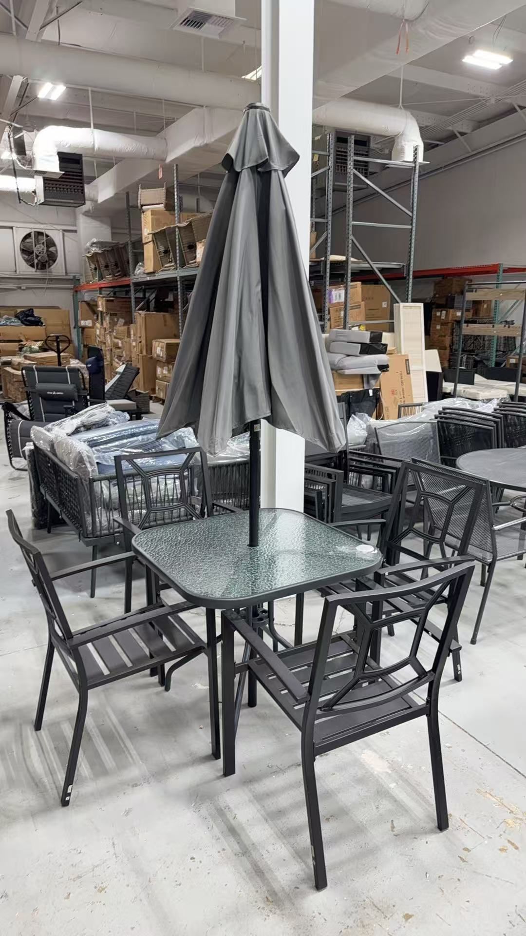 Brand new 6 pieces outdoor patio set with 4 chairs and one glass table and one umbrella