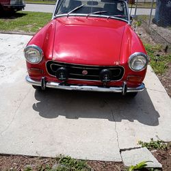 M. G. Midget. 1973.  Red  Convertible
