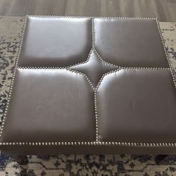Gray leather coffee table
