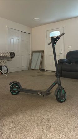 Electric Kick Scooter with Teal Accent Wheels