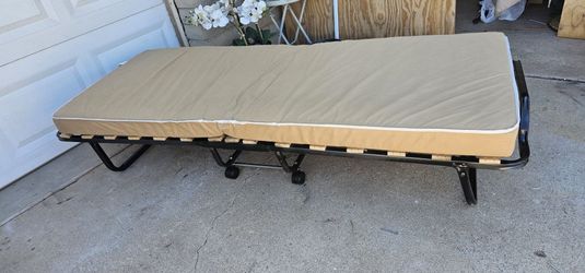 **Rollaway bed with mattress **