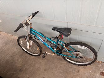 Teal Mountain Bike with Roadmaster Frame
