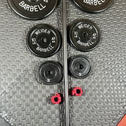 5 ft Standard Barbell with pairs of 25s, 10s and 5 pounders [ All Vintage and reconditioned equipment). Brute Weight= 95#